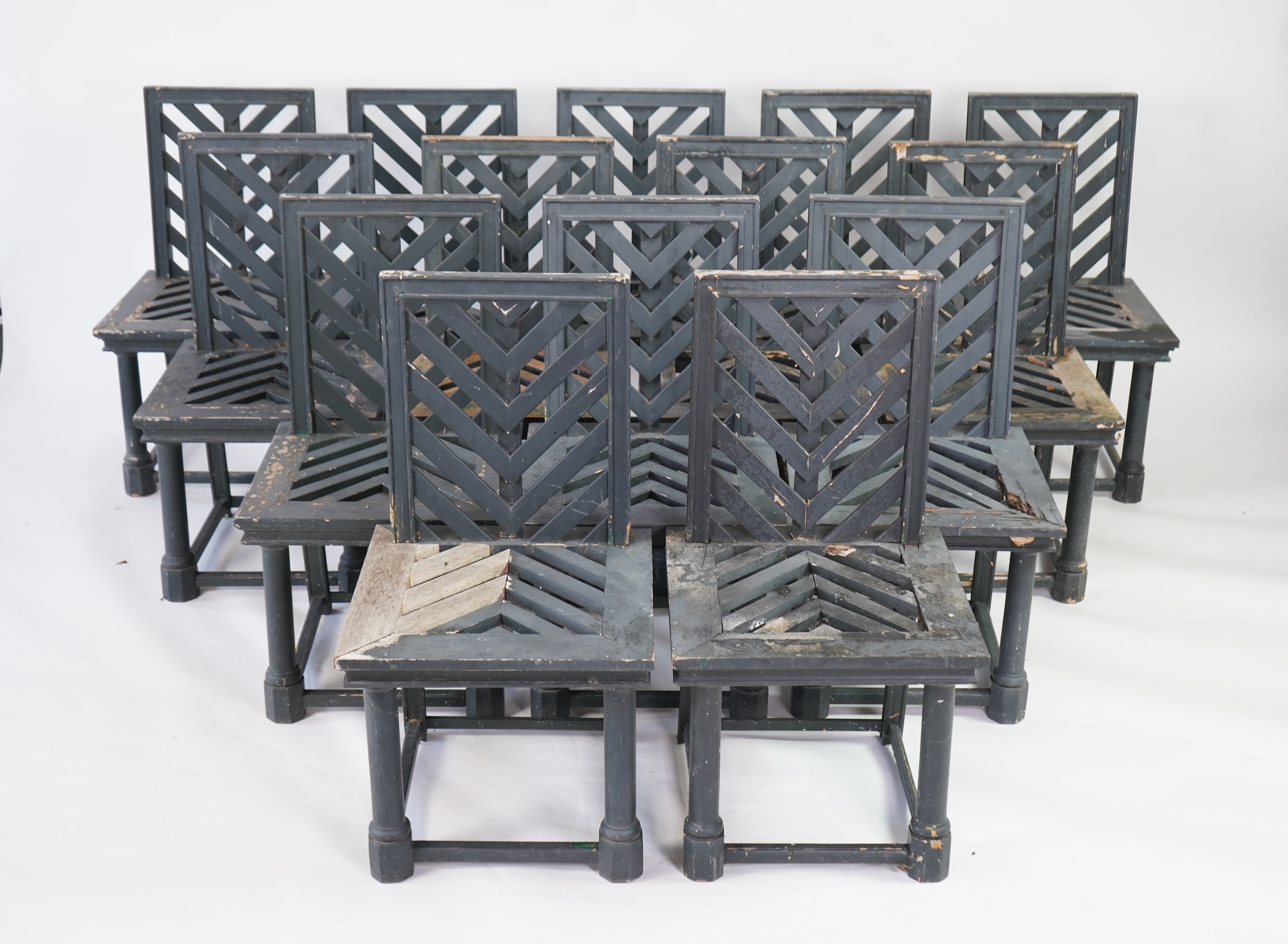 A set of fourteen green painted beech garden chairs, designed by Emilio Terry for the Theatre de Verdue, Chateau De Groussay